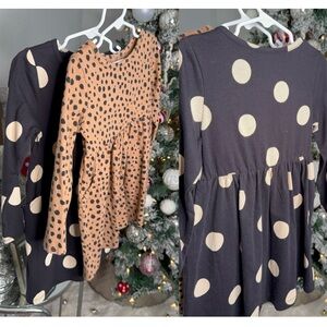 two animal print girl dresses and black and white bag, minimum use by